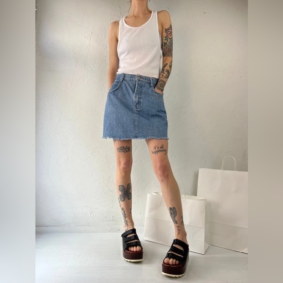 Nevada Dresses & Skirts - Vintage 90’s Nevada Raw Hem Denim Mini Skirt